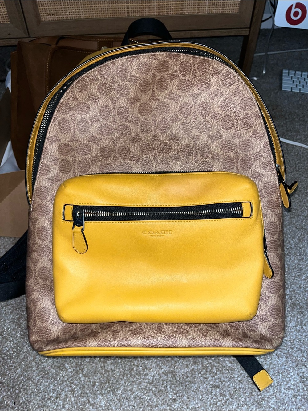 Coach Brown Signature Canvas Backpack with Yellow Leather Pocket